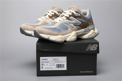 Bróga spóirt unisex New Balance 9060 Donn Gorm