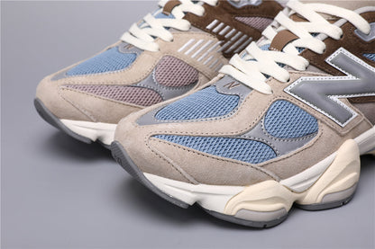 Bróga spóirt unisex New Balance 9060 Donn Gorm