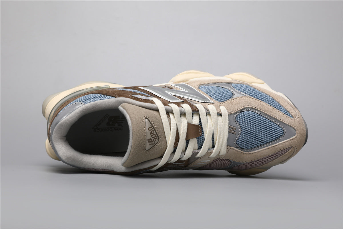 Bróga spóirt unisex New Balance 9060 Donn Gorm