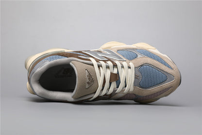 Bróga spóirt unisex New Balance 9060 Donn Gorm