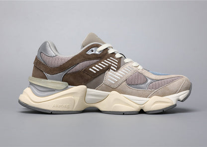 Bróga spóirt unisex New Balance 9060 Donn Gorm