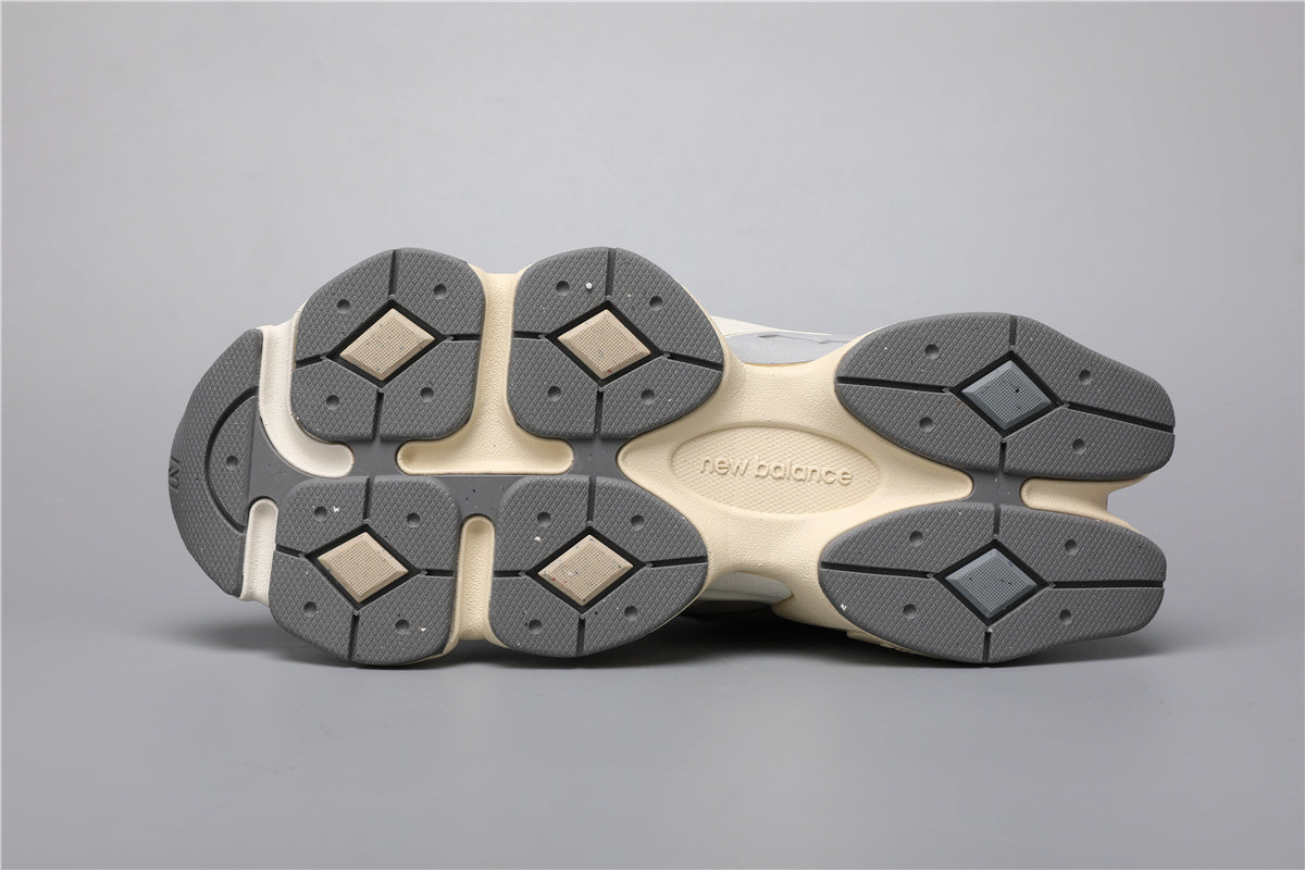 Bróga spóirt unisex New Balance 9060 Donn Gorm