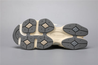Bróga spóirt unisex New Balance 9060 Donn Gorm